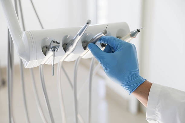 Professional Tooth Extraction technician working in League City, TX